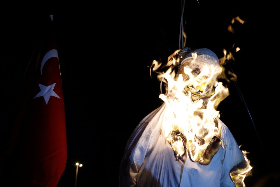  Gulen effigy is set alight to cheers of support from protesters