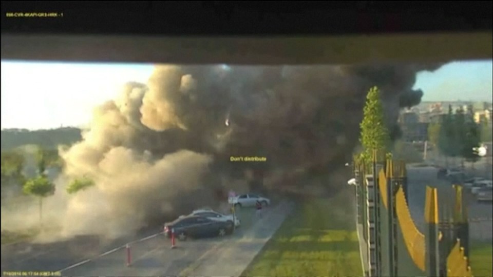  Plumes of black smoke can be seen coming from the blast