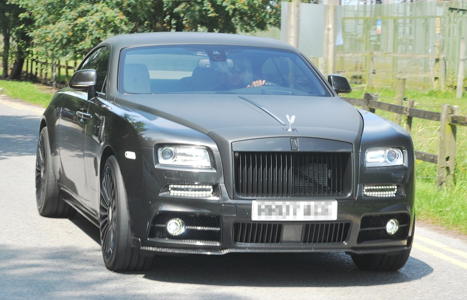  £25m flop Memphis Depay drives into United's Carrington training base