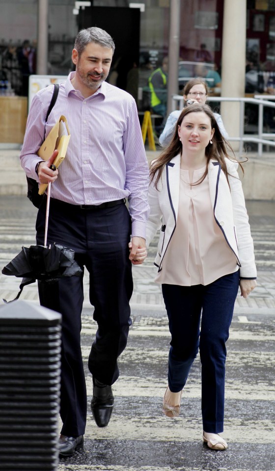  Kirsty Cahill, 33, pictured with her new partner Neil Munro outside court