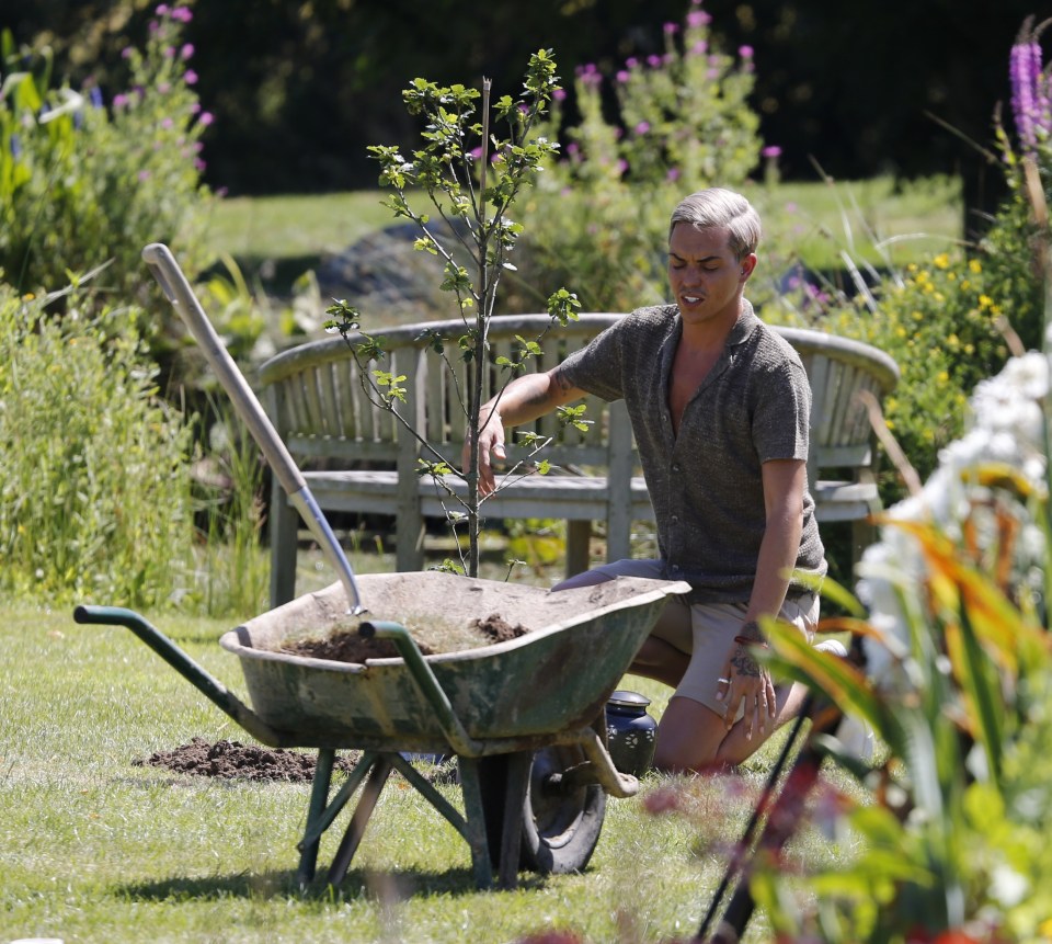  Bobby looked devastated as he planted a tree in memory of his beloved pooch