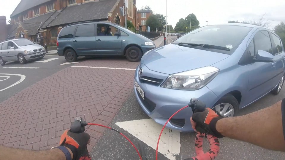  The cyclist tries to stop but soon runs out of road