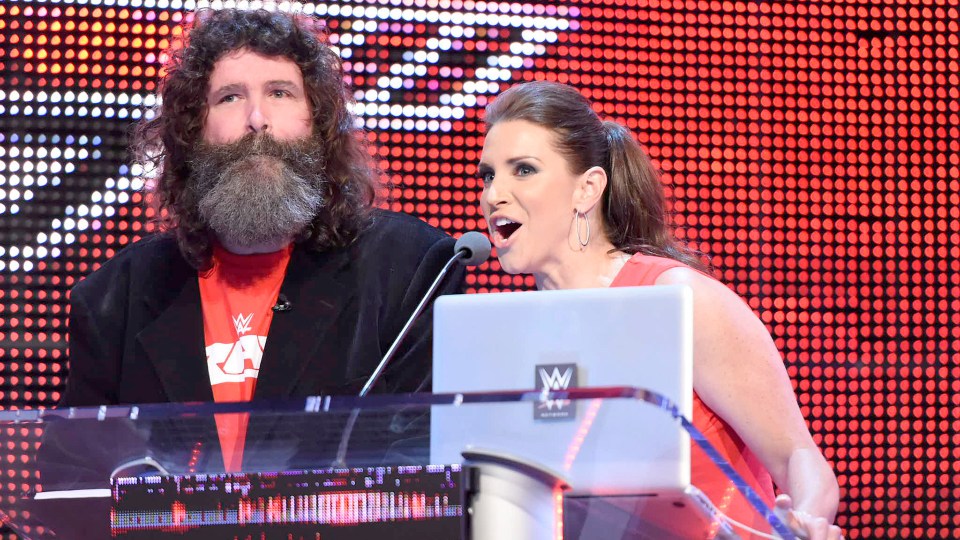  Mick Foley and Stephanie McMahon in her on-screen role as general manager of Monday Night Raw with commissioner Mick Foley