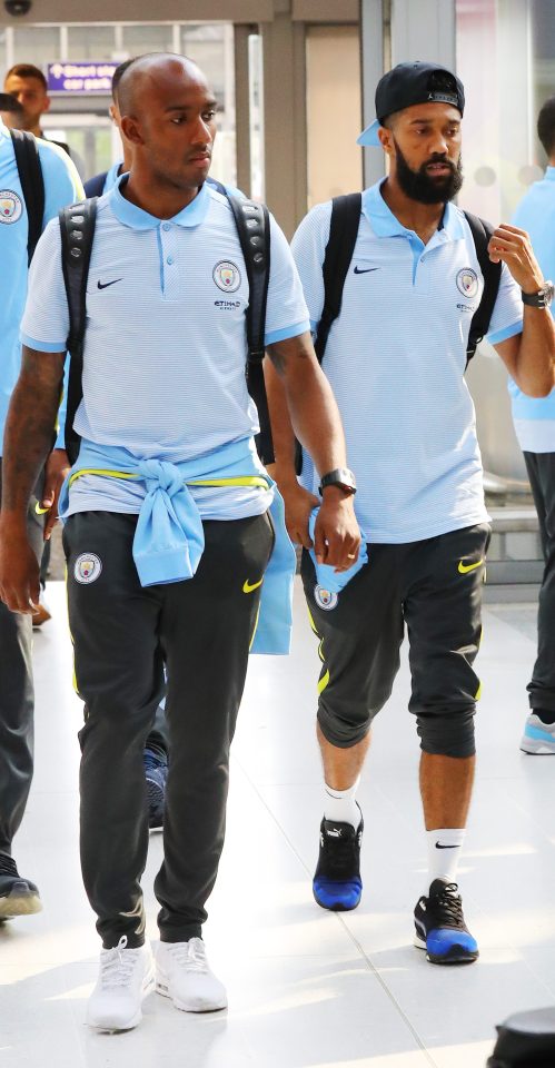 Best pals Fabian Delph and Gael Clichy walk side by side towards the plane