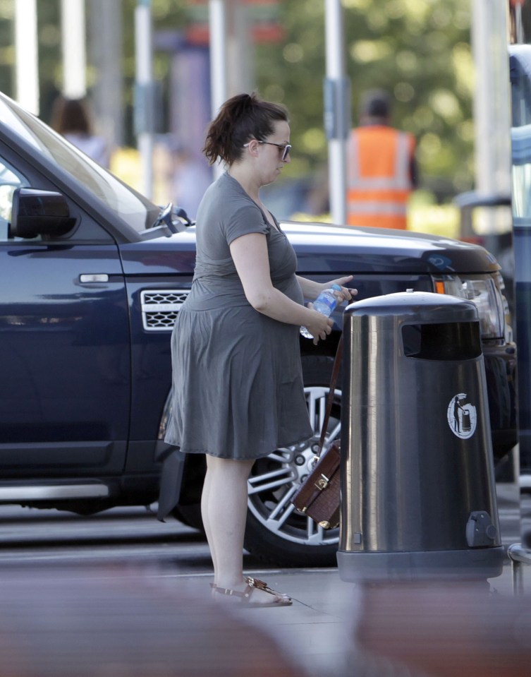 The actress kept hydrated in the hot weather 