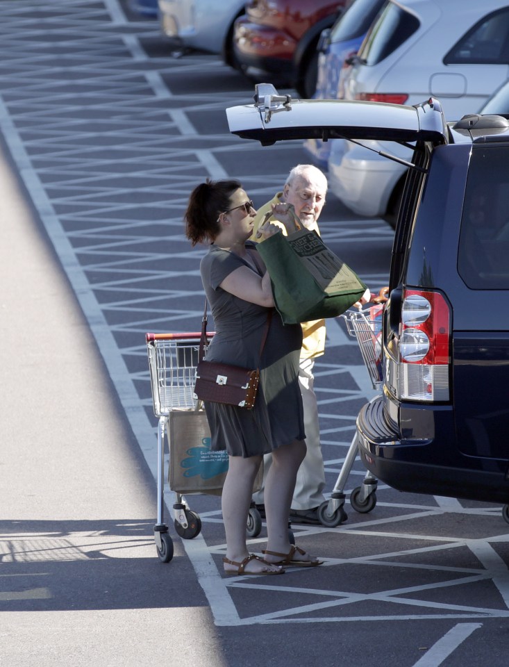 Natalie tried to stay cool in the heatwave in a grey dress and sandals 