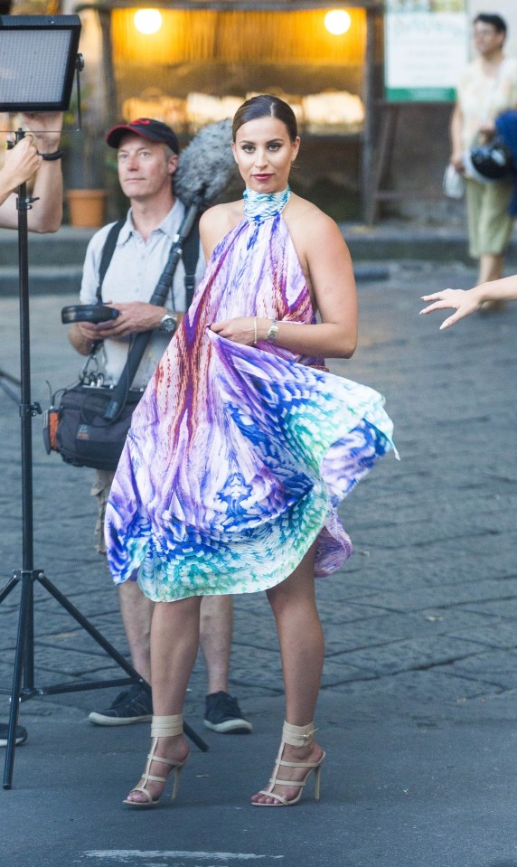  While Ferne, 25, stole the show in a muticoloured silk halterneck dress which she paired with caged heels