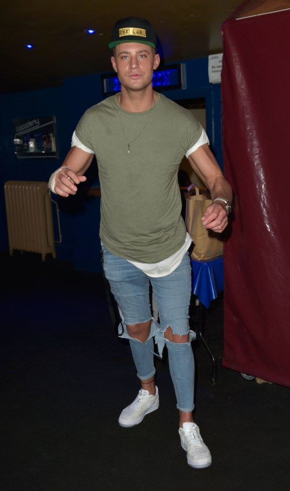  The 28-year-old was in great spirits as he arrived to a large and eager crowd dressed ripped jeans and layered tops which he teamed with white trainers and a black hat