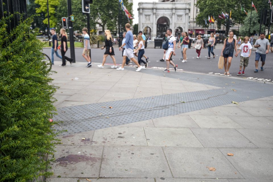  Blood is seen beside the entrance to Hyde Park today following last night's violence