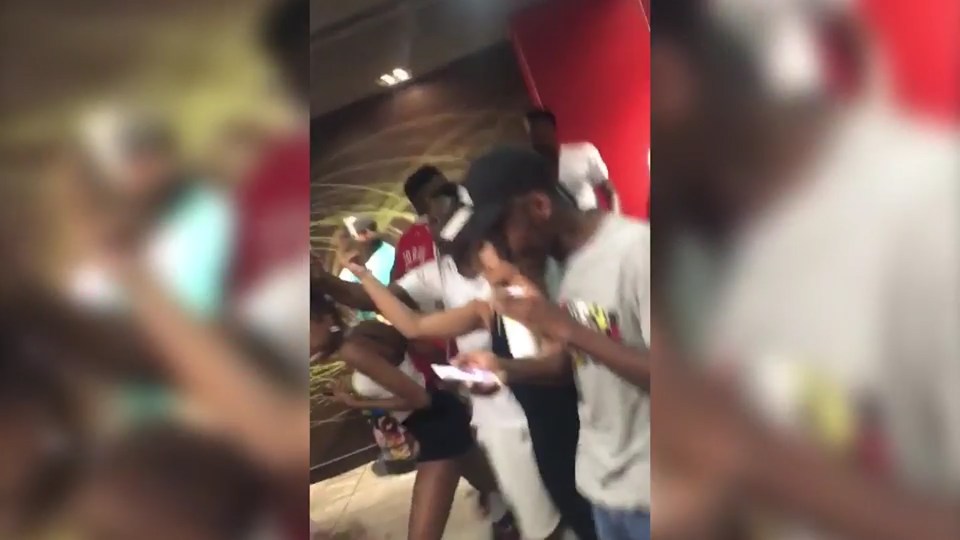  Teens run out after snatching burgers and drinks from behind the counter