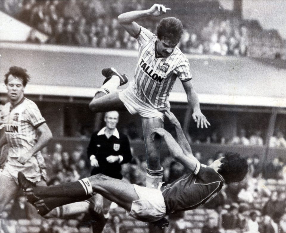  The player . . . . crunching tackle on Birmingham's Mick Harford