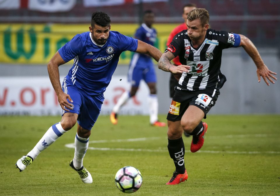  Diego Costa seems content in a Chelsea shirt once again under Antonio Conte's instruction