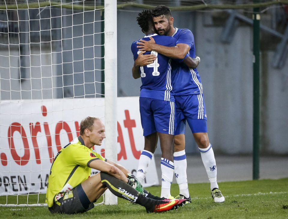  Diego Costa and Bertrand Traore embrace after the latter scores the Blues' opener