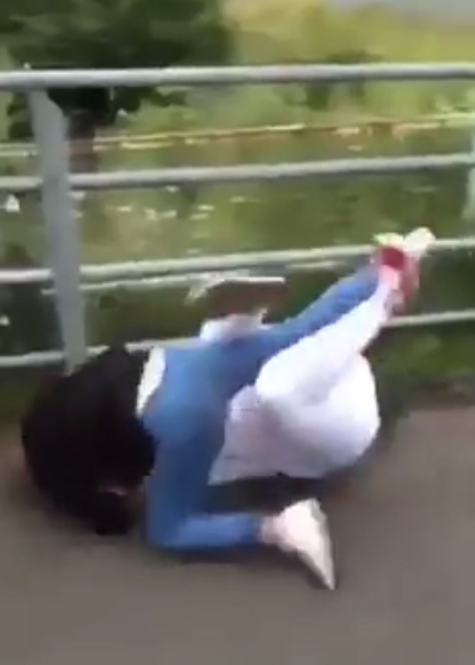  One girl managed to climb on top of the other as they rolled about on the floor