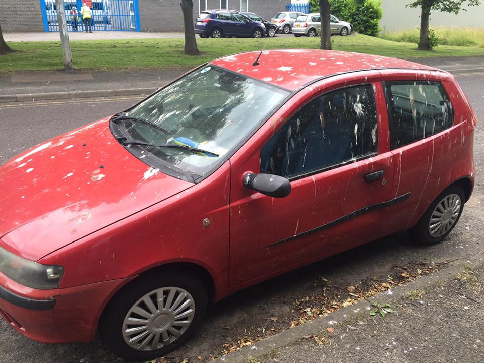 A parked car sits covered in seagull poo in Milton Keynes