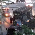  Stand-off... SWAT teams corner a suspect who barricaded himself in an SUV after throwing a hoax bomb into a police vehicle in New York