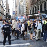  Chaos... police direct pedestrians away from Columbus circle as negotiators try to coax the suspect from the car