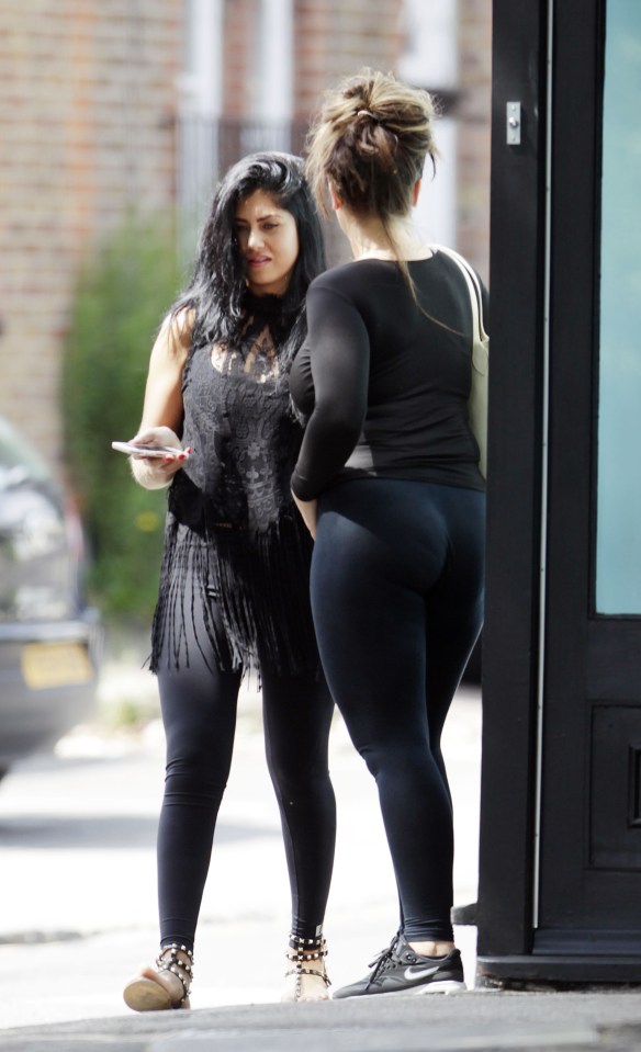  Dressed down in leggings and a fitted long-sleeved top she was joined by a friend as they headed out