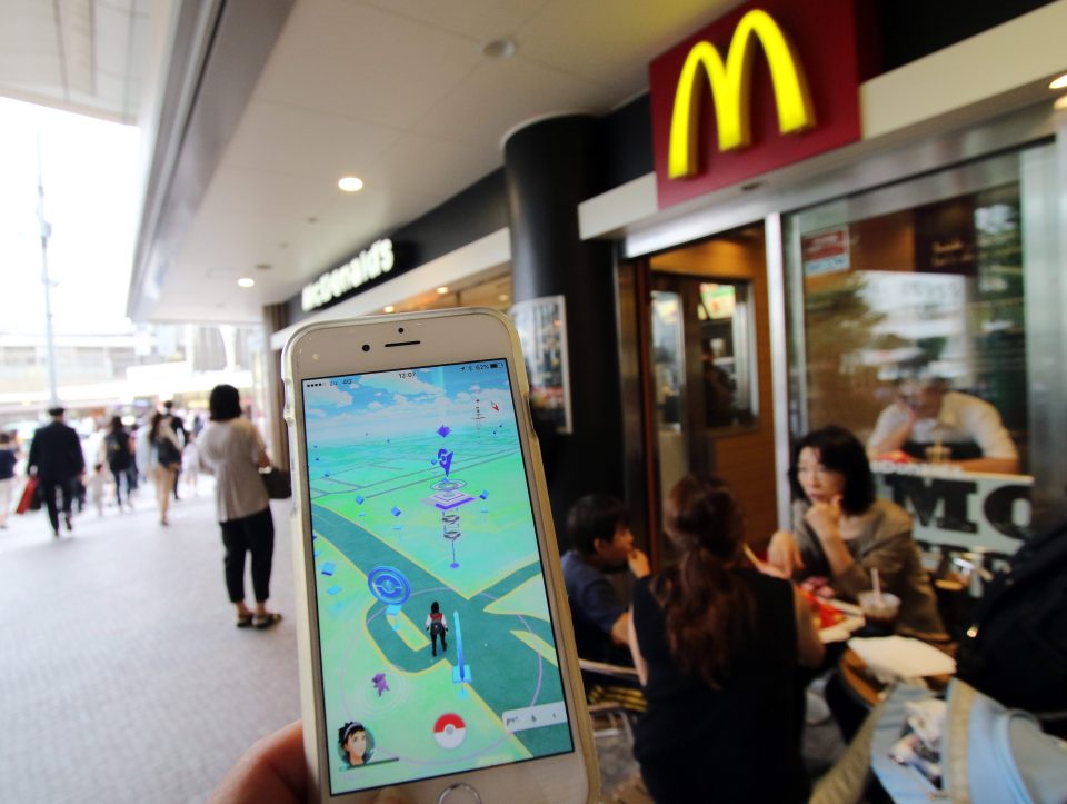  Attracting customers ... McDonald's in Japan has signed a deal with the game's developers to attract more players to its restaurants