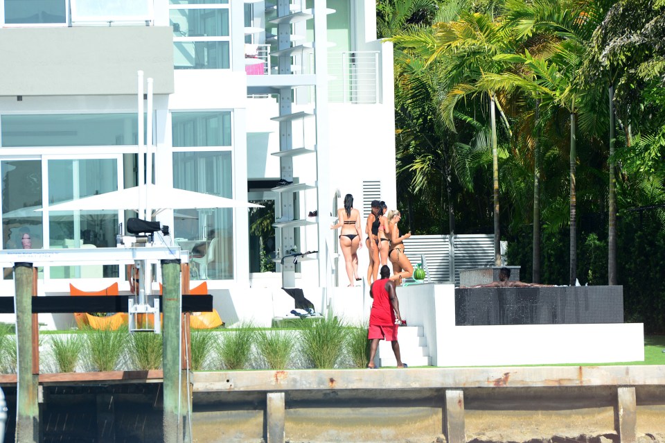  A bevy of bikini-clad girls partied with the players at the Miami mansion