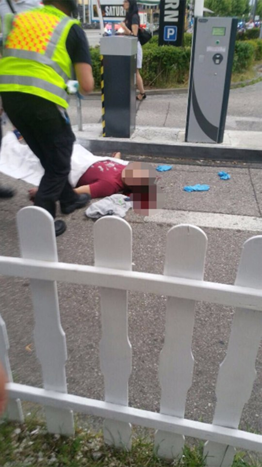  A victim of the attack who is thought to appear in the video lies dead