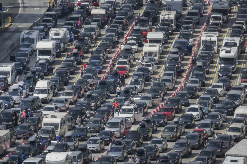  Carriageway chaos . . . Motorists have reportedly been 'trapped' overnight and for as long as 24 hours as unlucky holidaymakers join mile-long traffic queues