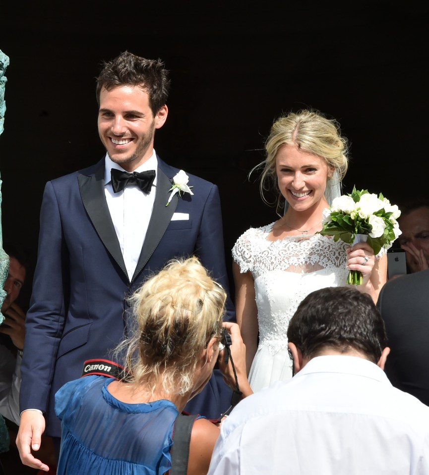  Scarlett's groom Rob Colicci looked dapper in a navy and black tuxedo with white crisp shirt