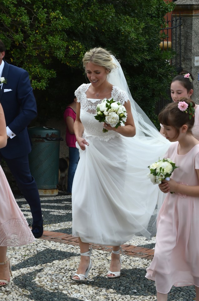  Former Hollyoaks star Scarlett Bowman has tied the knot in a lavish white wedding in Italy