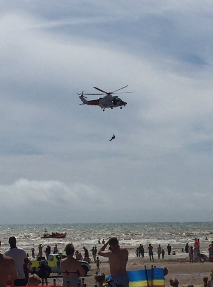  One man is missing feared dead and two others are in a life-threatening condition in hospital after they floundered in the water today