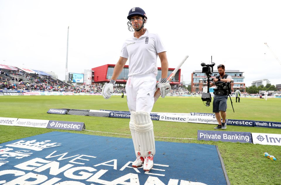 Alastair Cook leaves Old Trafford pitch as rain disrupts play during England's second innings