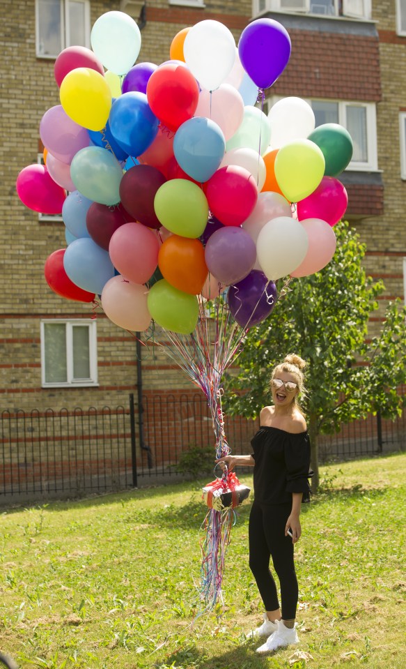  Olivia surprised Alex with a huge bunch of balloons for his birthday