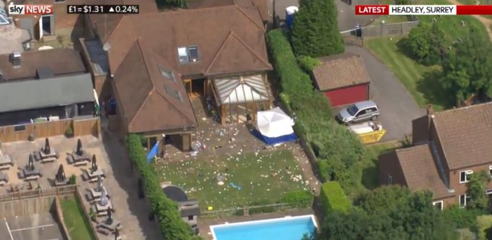  Police put a tent over the body in the garden in the aftermath of the deadly pool party shooting