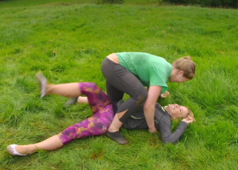  Down and dirty ... Helen is thrown to the ground by her wrestling instructor