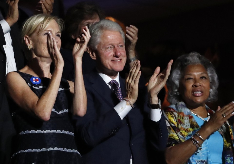  Hillary's husband Bill applauded along with the rest when Michelle finished her speech