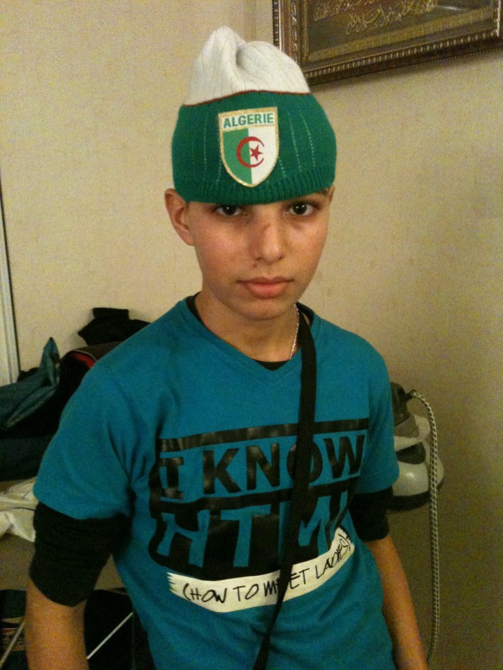  An old photo from the 19-year-old suspect's Facebook page showed him wearing an Algerian hat in a picture taken back in 2011