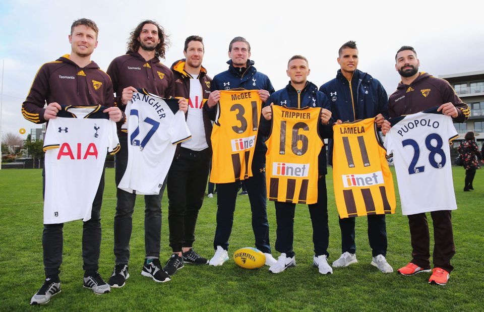  Spurs and Hawthorn Hawks stars swap shirts after the demonstration