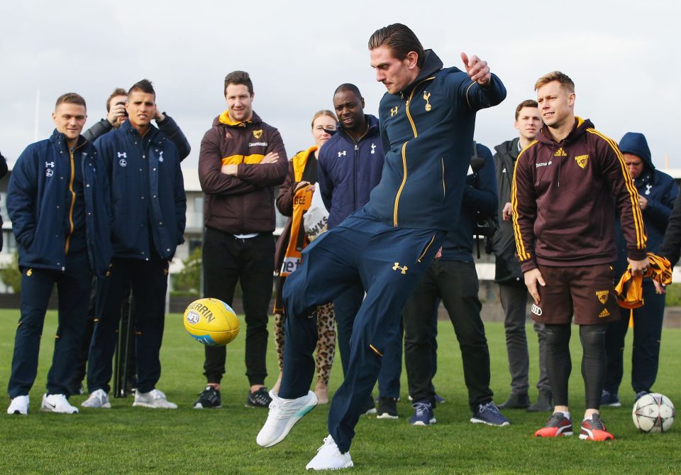  Spurs keeper Luke McGee has a go at perfecting Aussie Rules Football technique