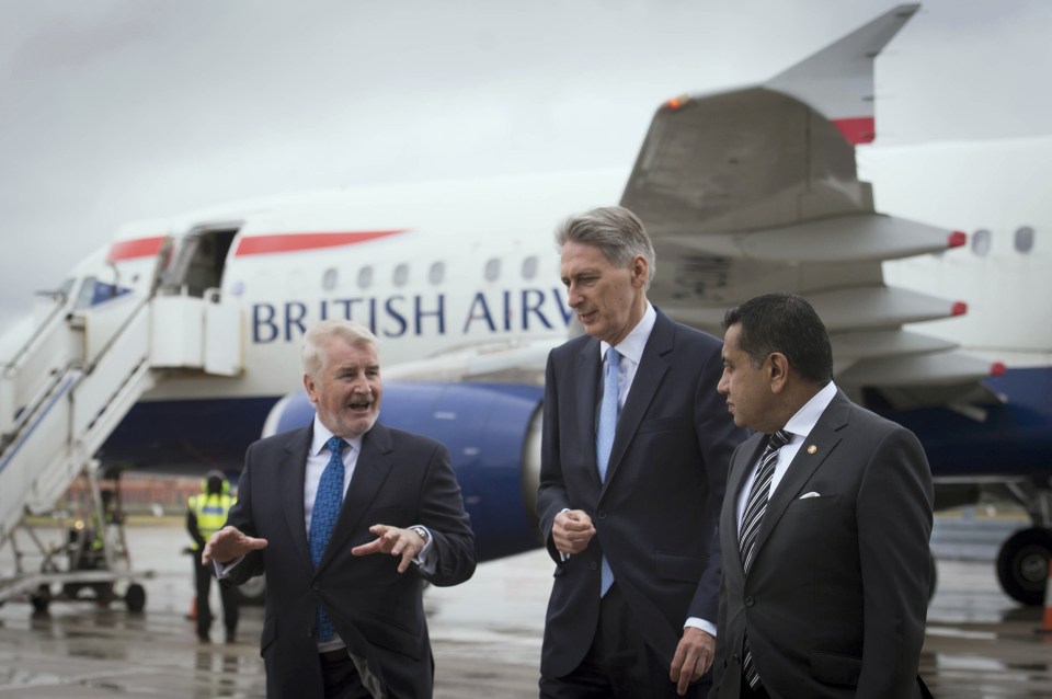  London City Airport chief executive Declan Collier (L) showed Chancellor Philip Hammond and Aviation Minister Lord Ahmad round the airport