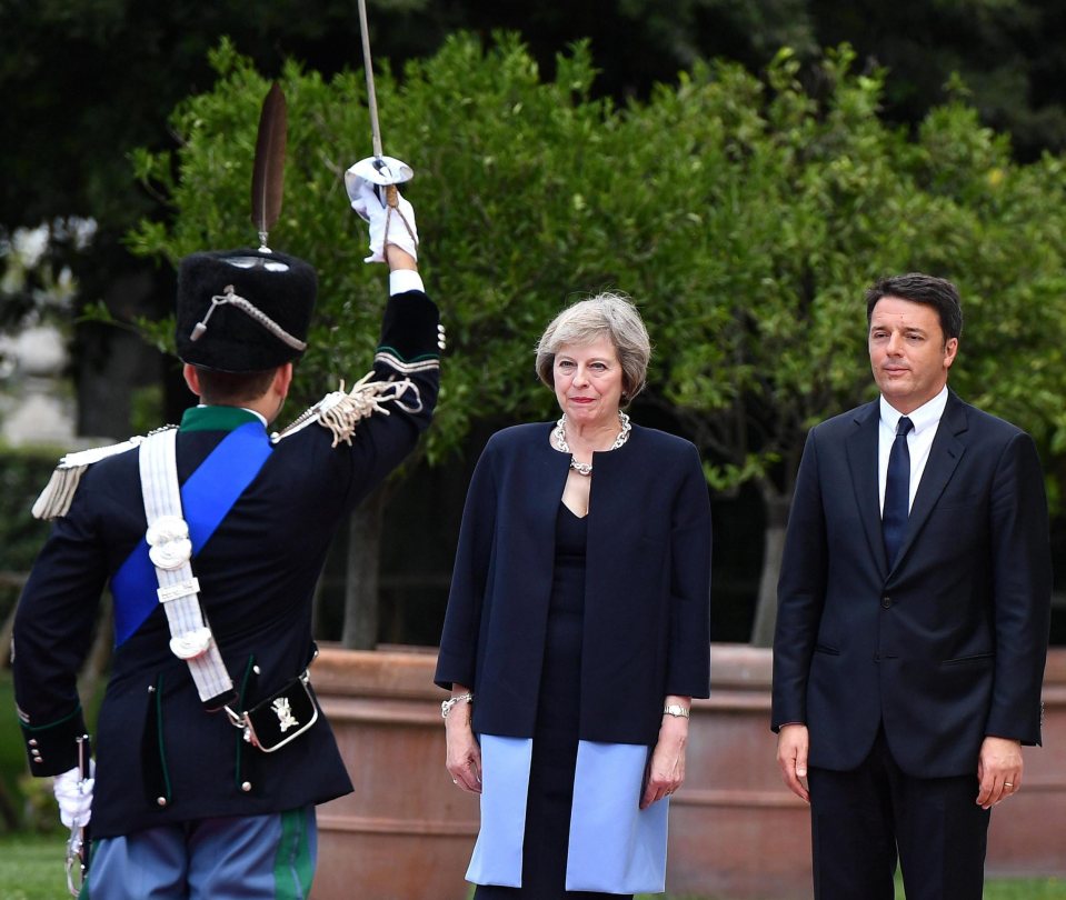  A guard of honour greeted Theresa May as she travelled to Rome to discuss Brexit with the Italian Prime Minister