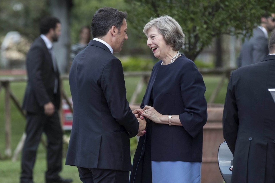  Matteo Renzi and Theresa May chat after she arrives in Rome for talks about Britain's relationship with the EU after Brexit