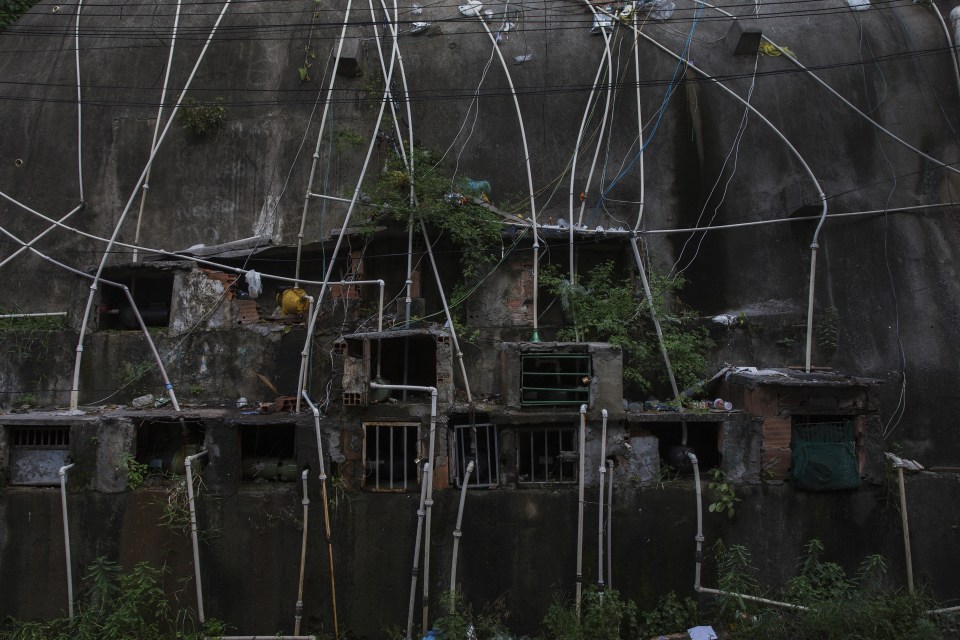  A tangle of illegal water pipes at the Pica-Pau slum in Rio de Janeiro