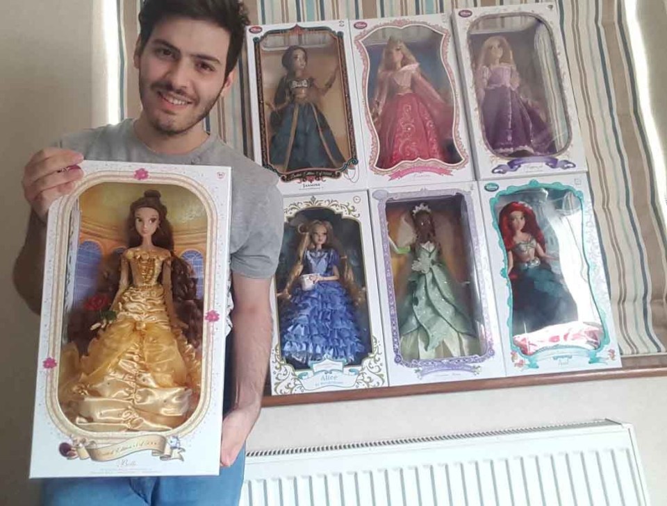  Nick with some of the over 50 Disney dolls he collects