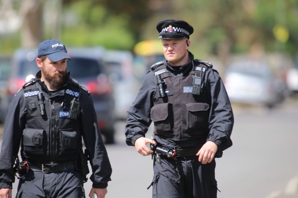  Police are in a standoff with a gunman in Smallfield, Surrey