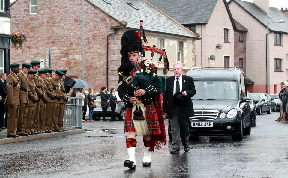 Earlier a lone piper led the hearse through city streets in tiny Ecclefechan