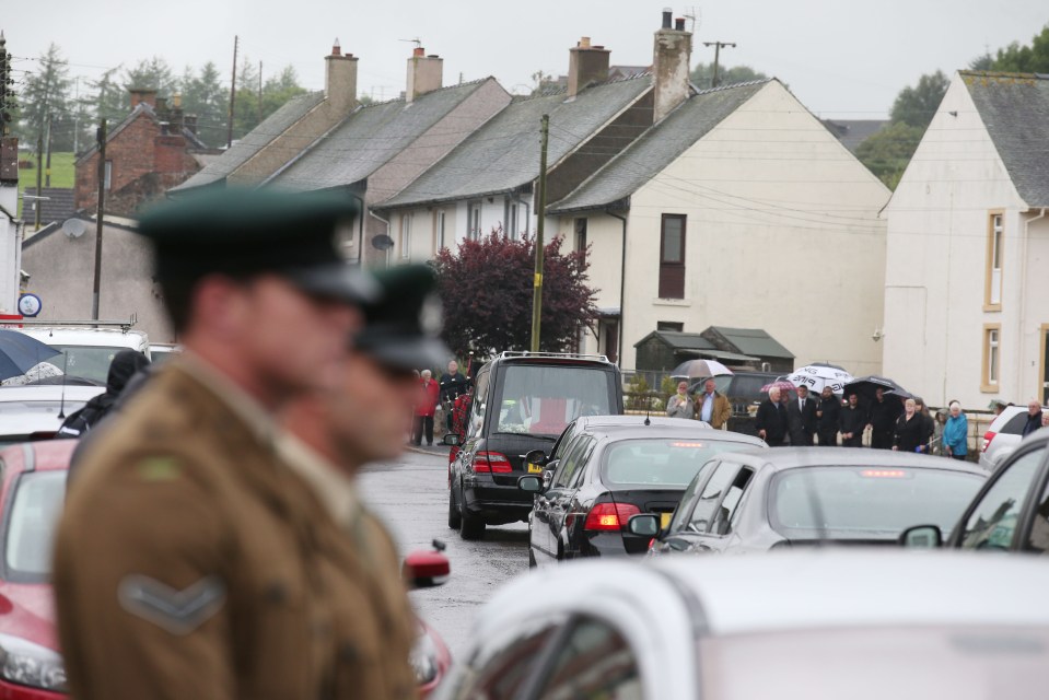 The hearse was driven slowly through the village on its way to the memorial centre where his service was held