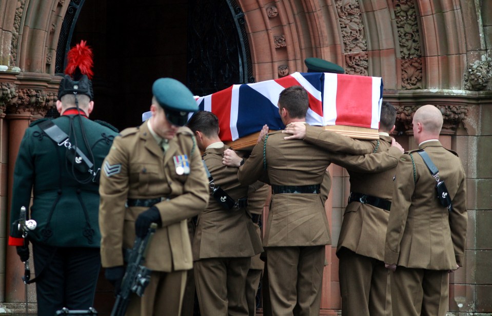 His coffin was carried into the memorial centre where the service was held