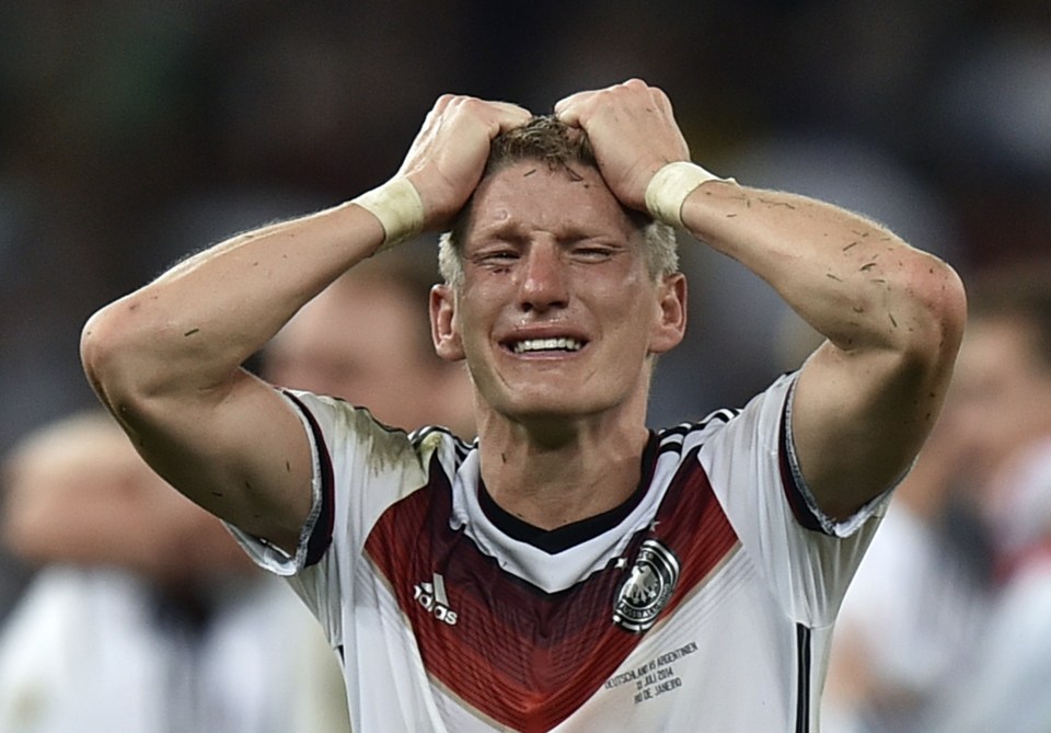 Bastian Schweinsteiger weeps after the World Cup final win over Argentina at the Maracana Stadium in Rio de Janeiro, Brazil