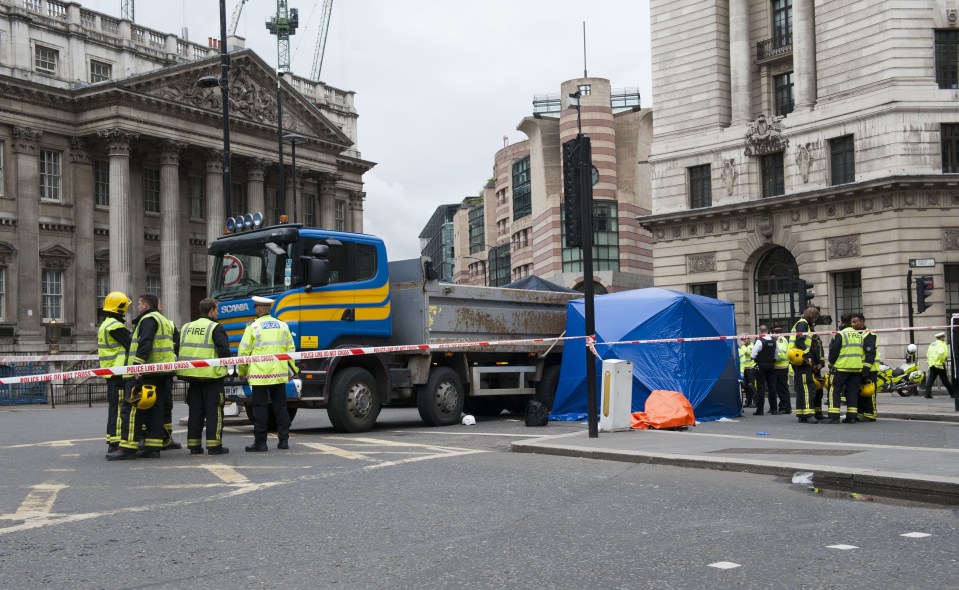  Police seal off the scene of the accident on June 22, 2015