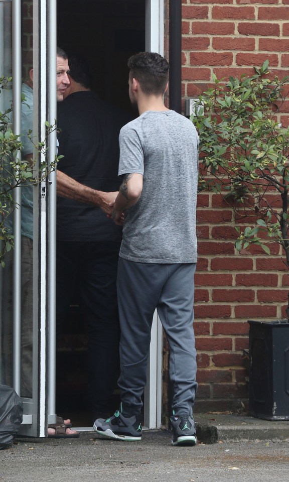  Liam was dressed casually for the studio day as he teamed a grey top with tracksuit bottoms and matching trainers