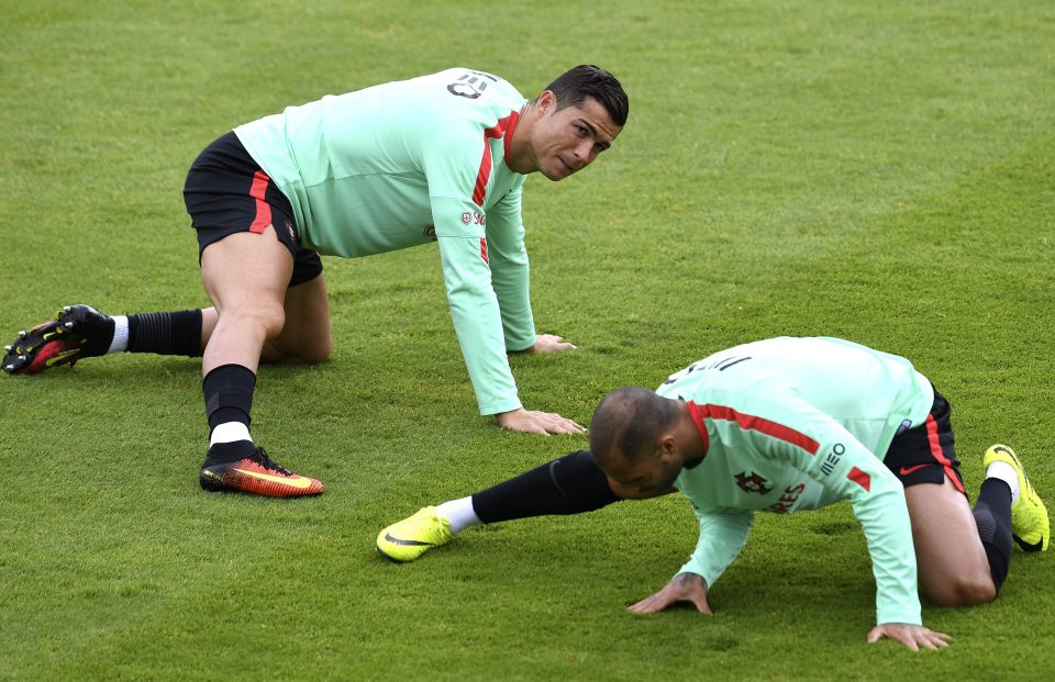  Mis-firing Madrid master Cristiano Ronaldo and fellow Portugal frontman forward Ricardo Quaresma train ahead of the semi-final clash with Wales on Wednesday